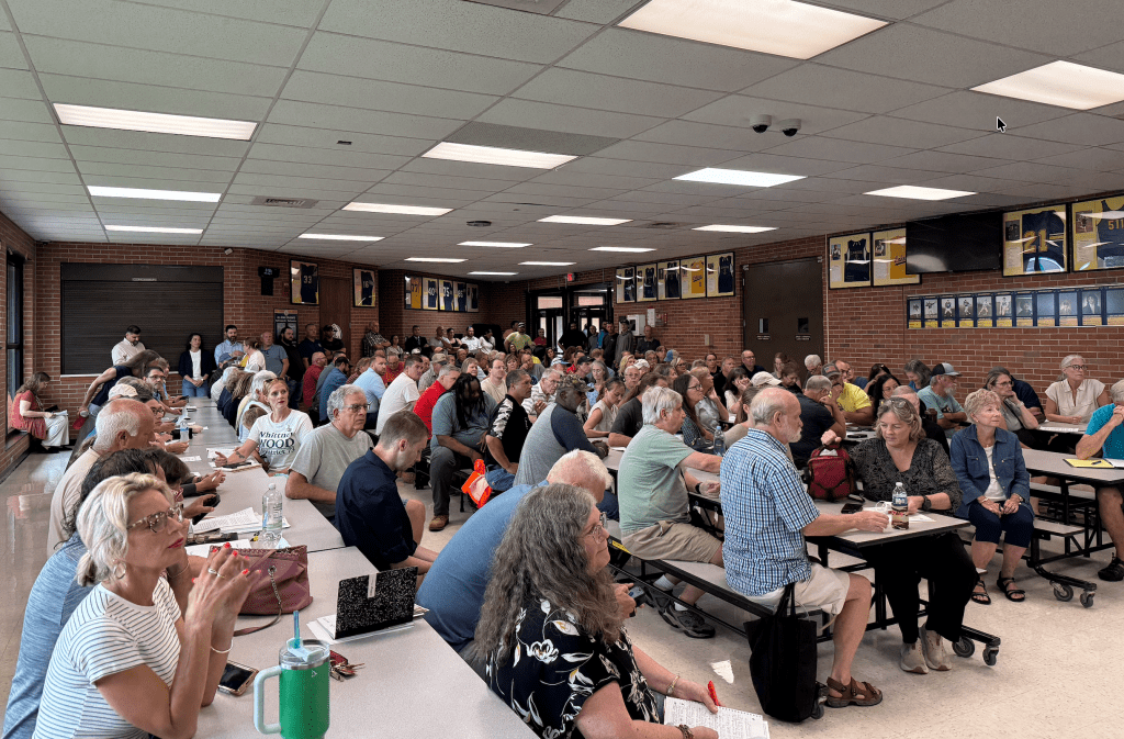 Residents filled up the cafeteria at Millersport Junior/Senior High School on Aug. 17, almost entirely in protest of a natural gas plant to power a Vantage data center about a mile away.